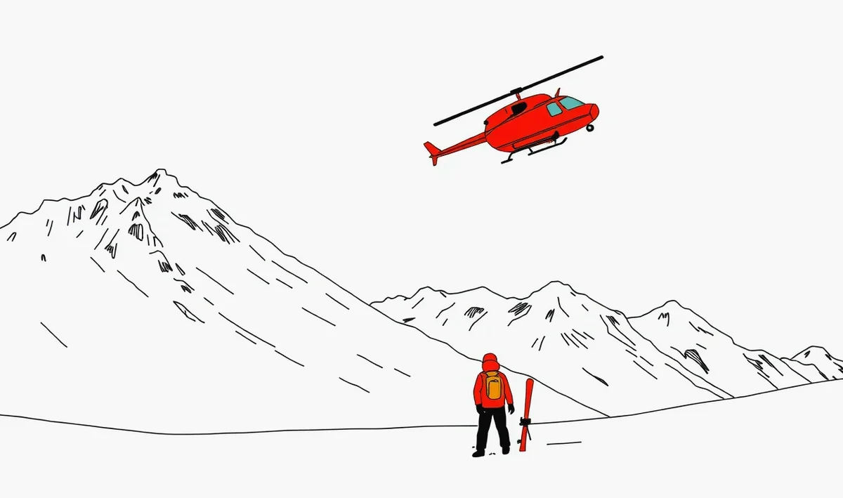 Snowboardista stojaci na zasneženom svahu s výhľadom na horské štíty
